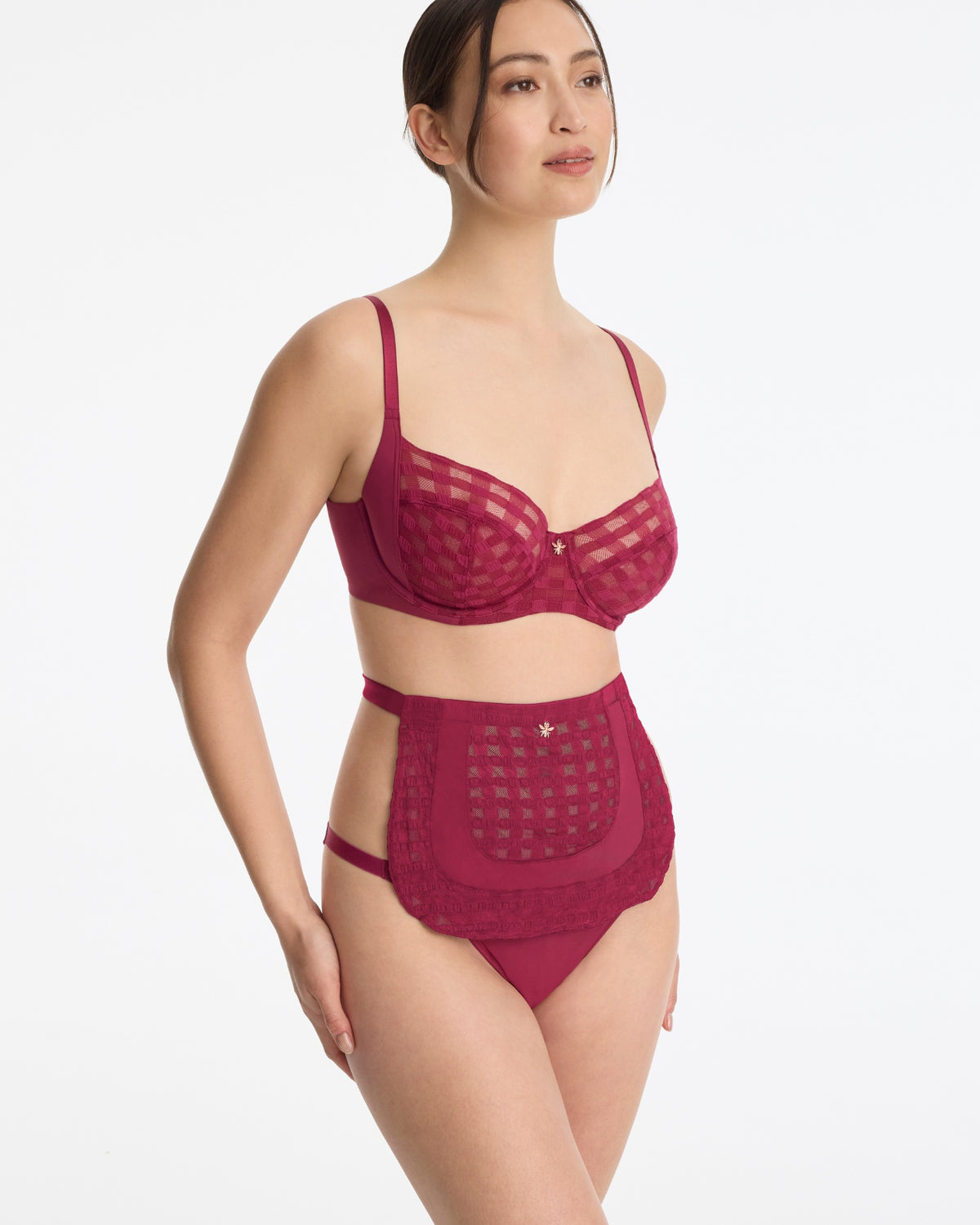 Skarlett Blue Bonbon Full Coverage Gingham Lace Bra and Bonbon Gingham Lace Half Apron in Maraschino - model three-quarter view in bra and lace apron