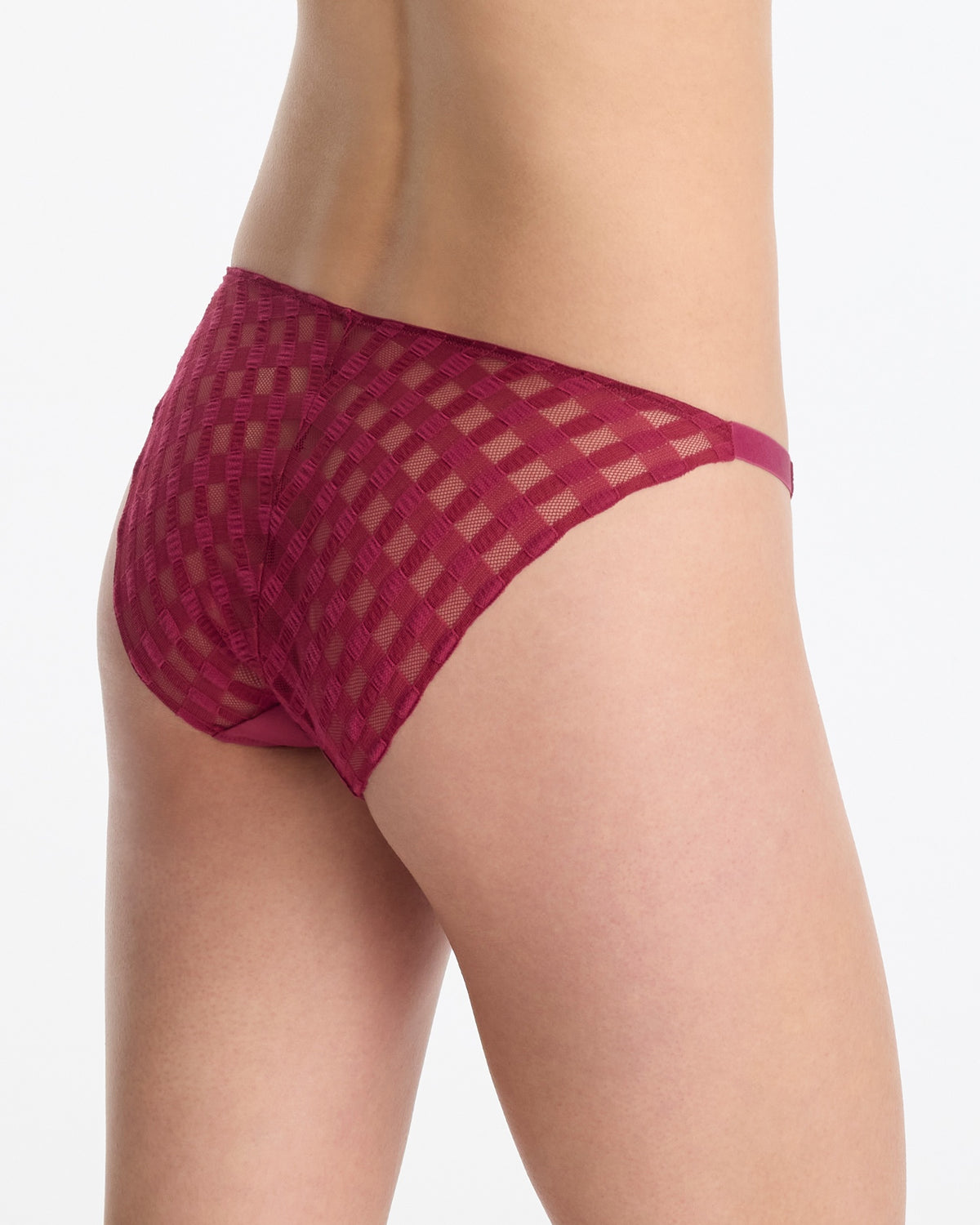 Skarlett Blue Bonbon Gingham Lace String Bikini in Maraschino - model back three-quarter view in sheer string bikini underwear with gingham lace