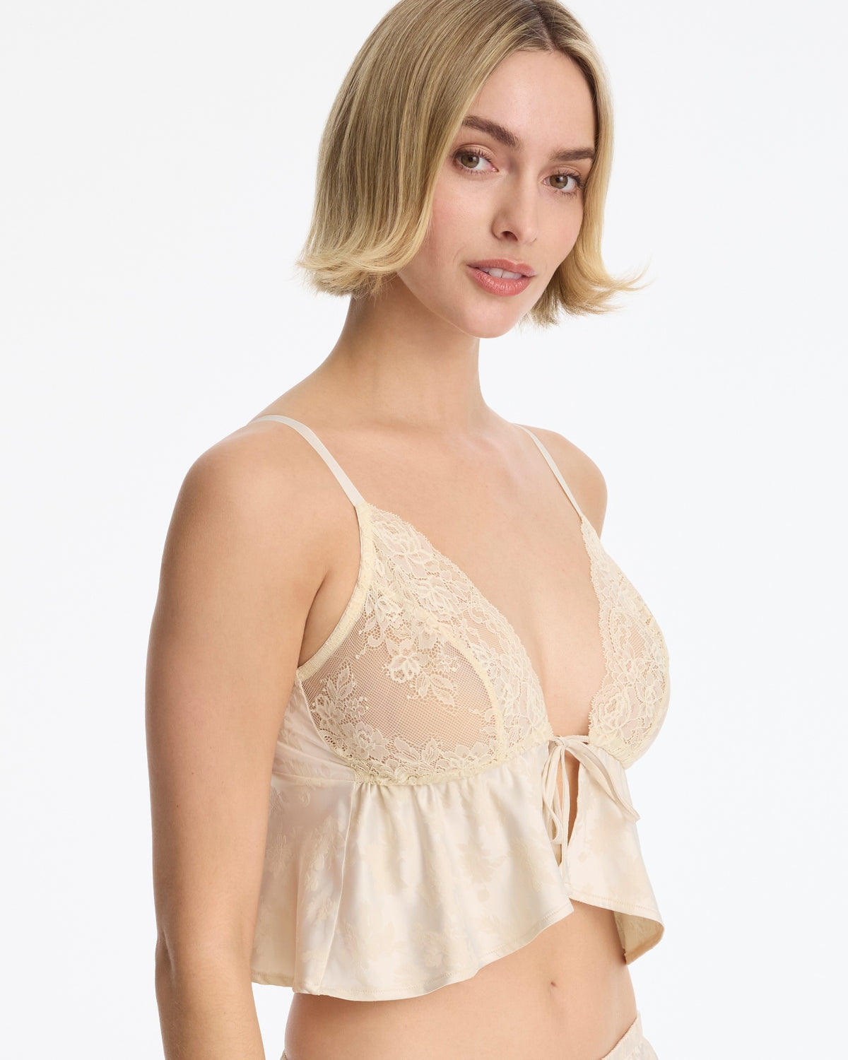 Skarlett Blue Captivate Satin & Lace Flutter Cami in Candlelight - model three-quarter view in lace triangle cami with scalloped lace