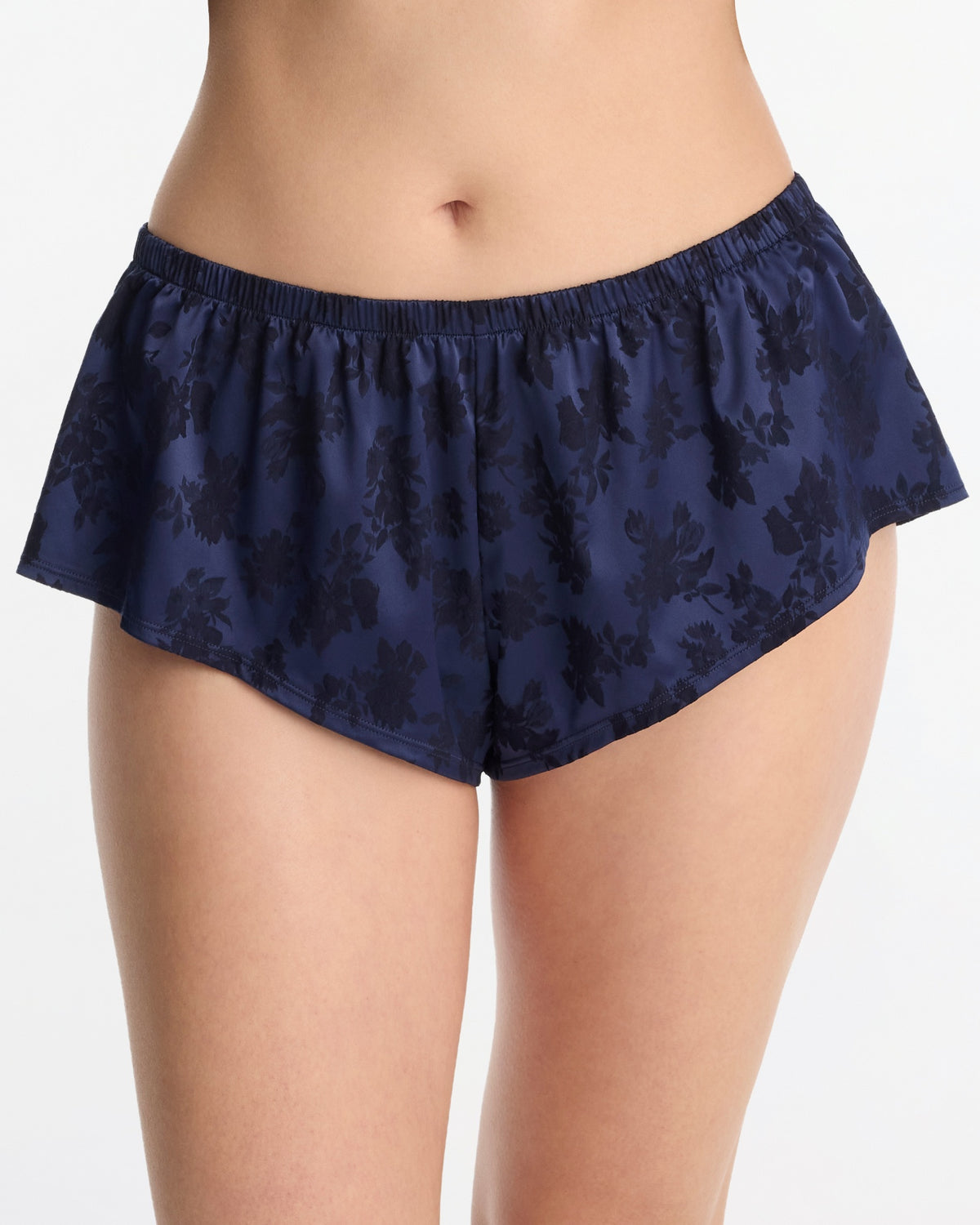 Skarlett Blue Captivate Satin Flutter Short in Midnight - model front view in satin sleep shorts with flutter hem and jacquard sheen