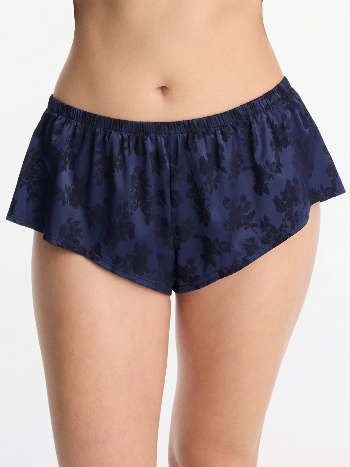 Skarlett Blue Captivate Satin Flutter Short in Midnight - model front view in satin sleep shorts with flutter hem and jacquard sheen