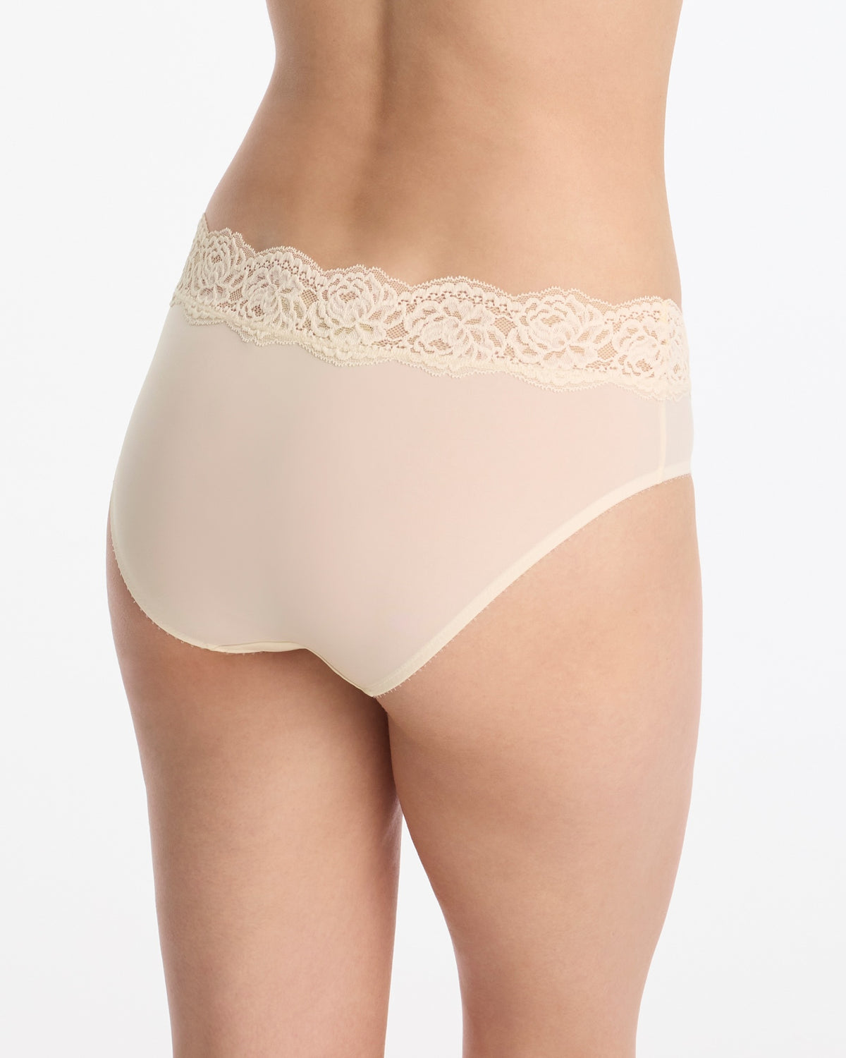 Skarlett Blue Divine Lace Trim Hipster in Candlelight - model back view in mid-rise hipster underwear with floral lace waistband