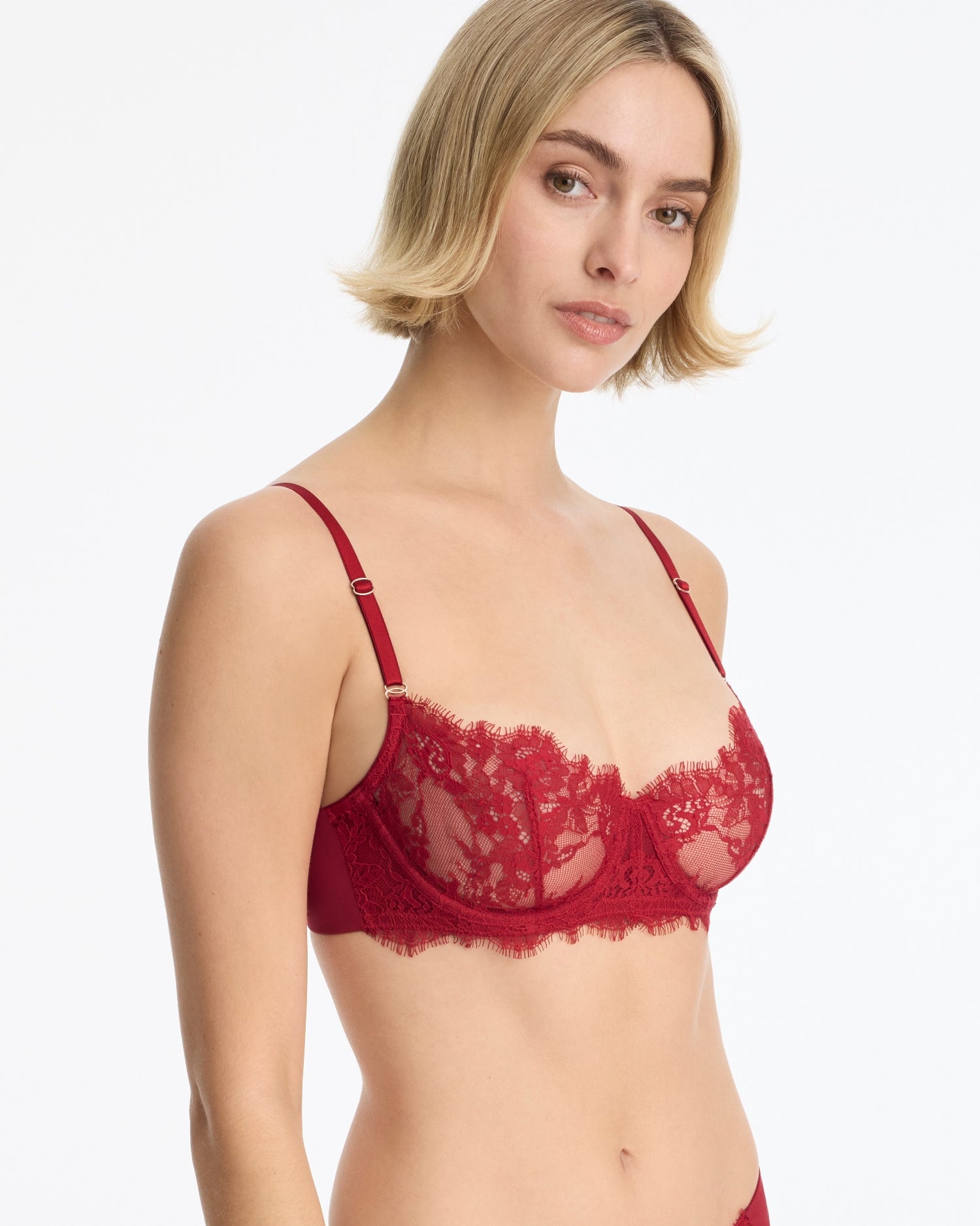 Skarlett Blue Entice Lace Balconette Bra - Model in a scarlet red sheer lace balconette bra