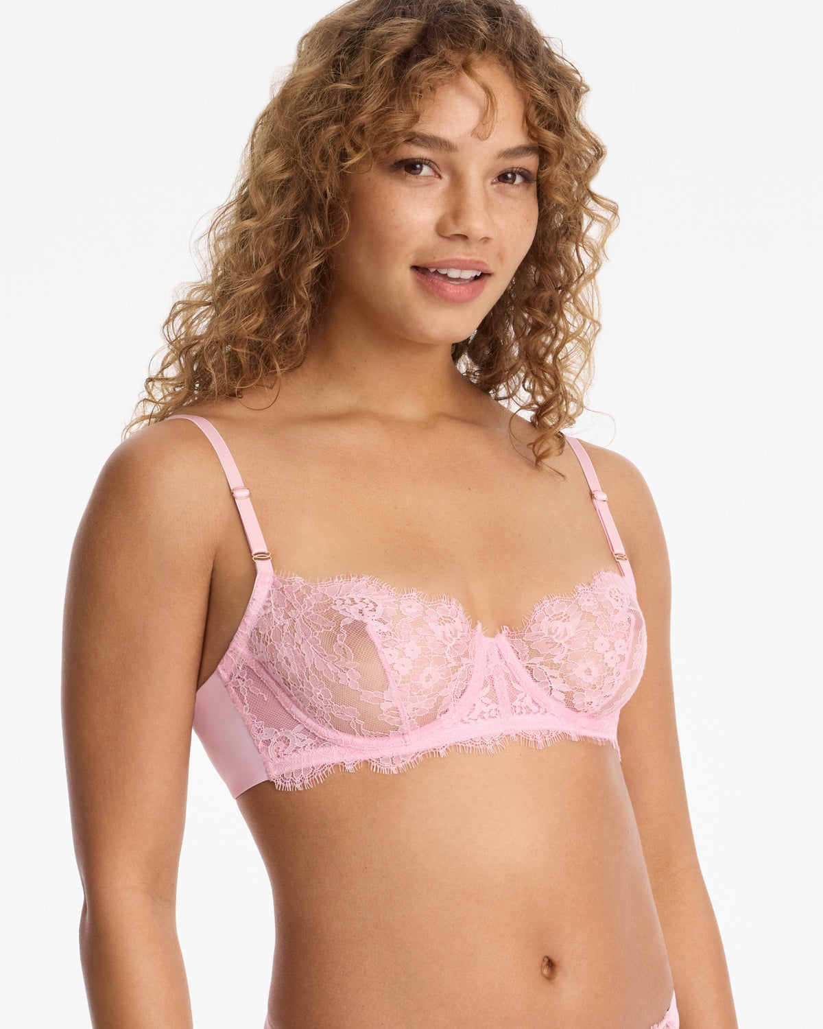 Skarlett Blue Entice Lace Balconette Bra in Strawberry Cream - model three-quarter close-up in sheer lace underwire balconette bra
