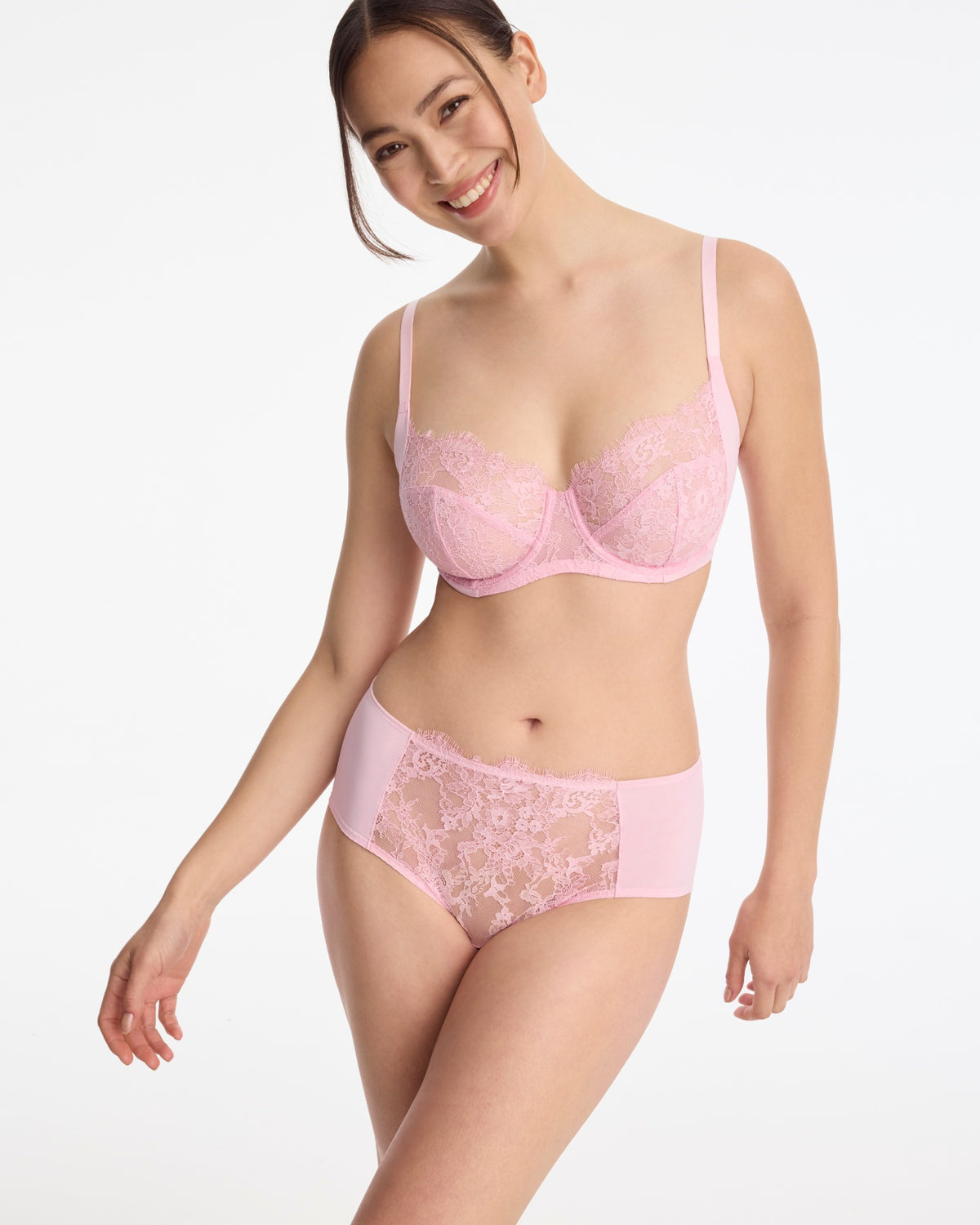 Skarlett Blue Entice Full Coverage Lace Brief in Strawberry Cream - model front view in full coverage lace brief with sheer floral lace panel