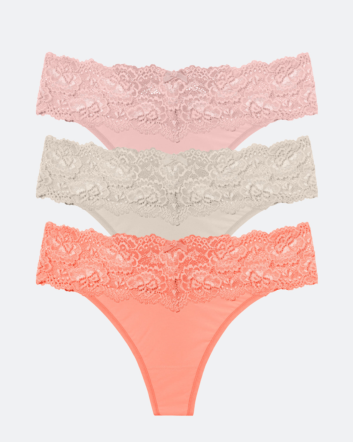 Skarlett Blue Goddess Lace Trim Thong 3-Pack - FINAL SALE in Romance/Dove Grey/Pink Petal - flat lay front view of three lace-trim thongs