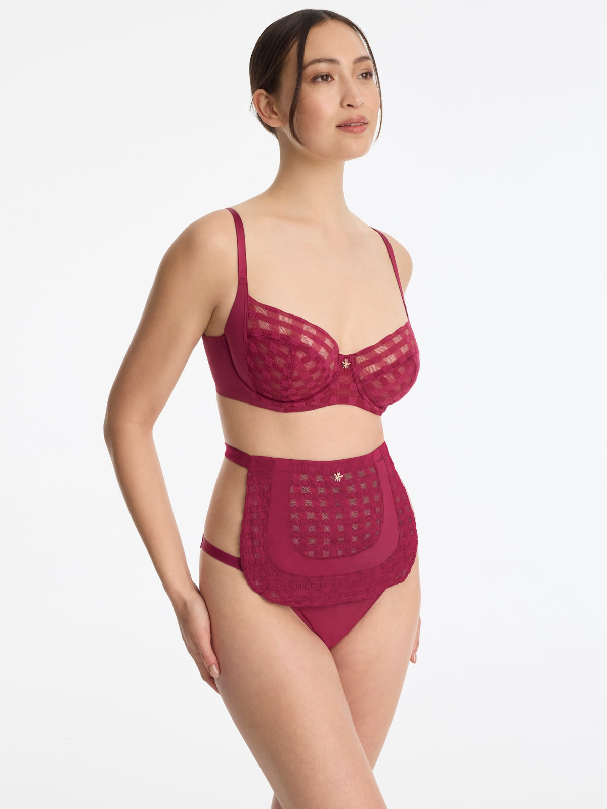 Skarlett Blue Bonbon Full Coverage Gingham Lace Bra and Bonbon Gingham Lace Half Apron in Maraschino - model three-quarter view in bra and lace apron
