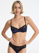 Skarlett Blue Captivate Satin & Lace Balconette Underwire Bra and Captivate Satin & Lace Bikini in Midnight/Black - front view model in balconette bra and bikini