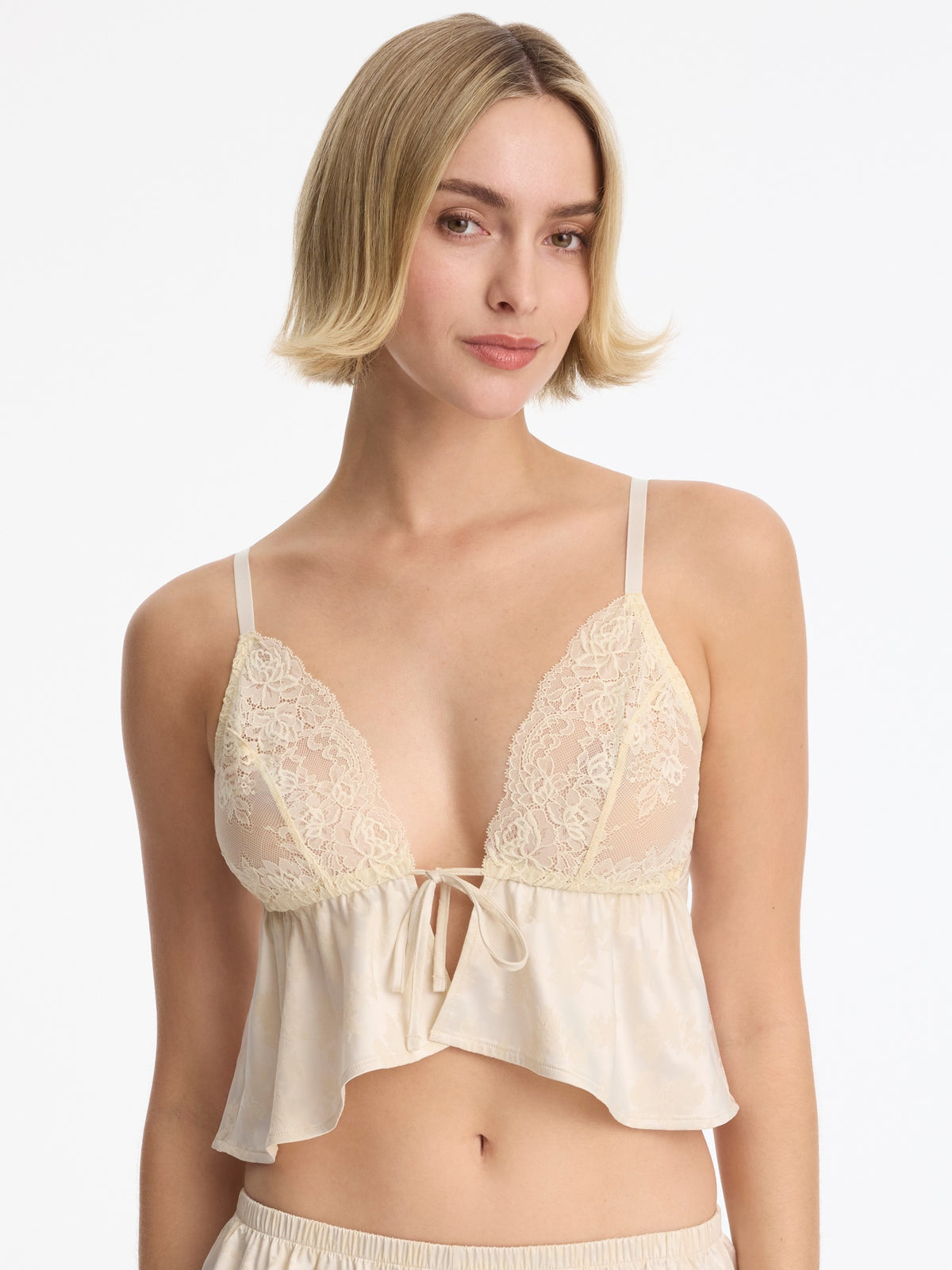 Skarlett Blue Captivate Satin & Lace Flutter Cami in Candlelight - model front view in satin and lace cami with tie-front cups
