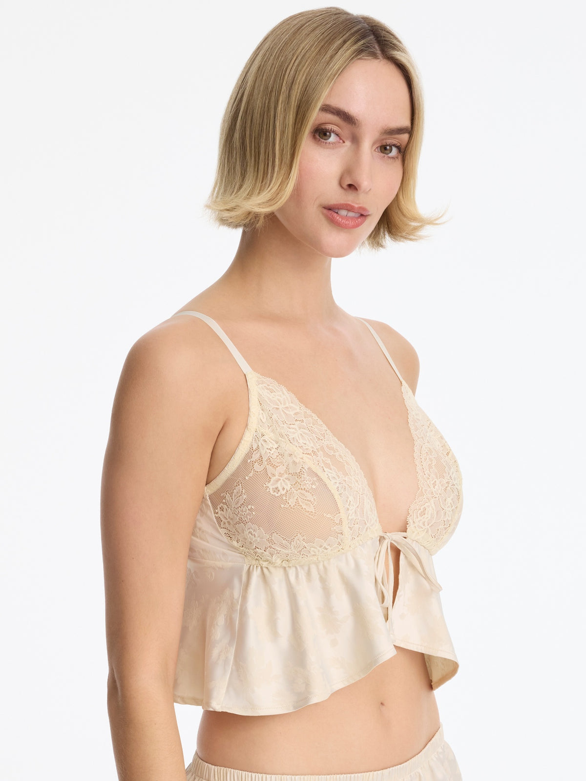 Skarlett Blue Captivate Satin & Lace Flutter Cami in Candlelight - model three-quarter view in lace triangle cami with scalloped lace