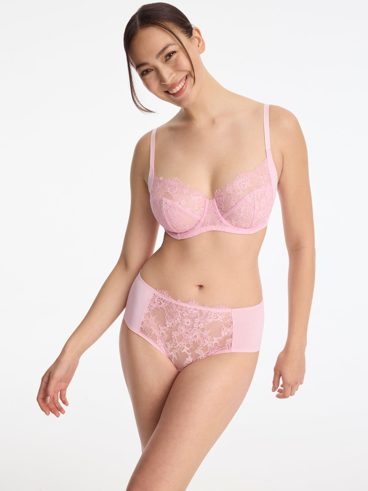 Skarlett Blue Entice Full Coverage Lace Brief in Strawberry Cream - model front view in full coverage lace brief with sheer floral lace panel