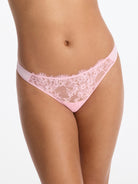 Skarlett Blue Entice Lace Front Thong in Strawberry Cream - model close-up three-quarter view in lace thong with sheer front panel