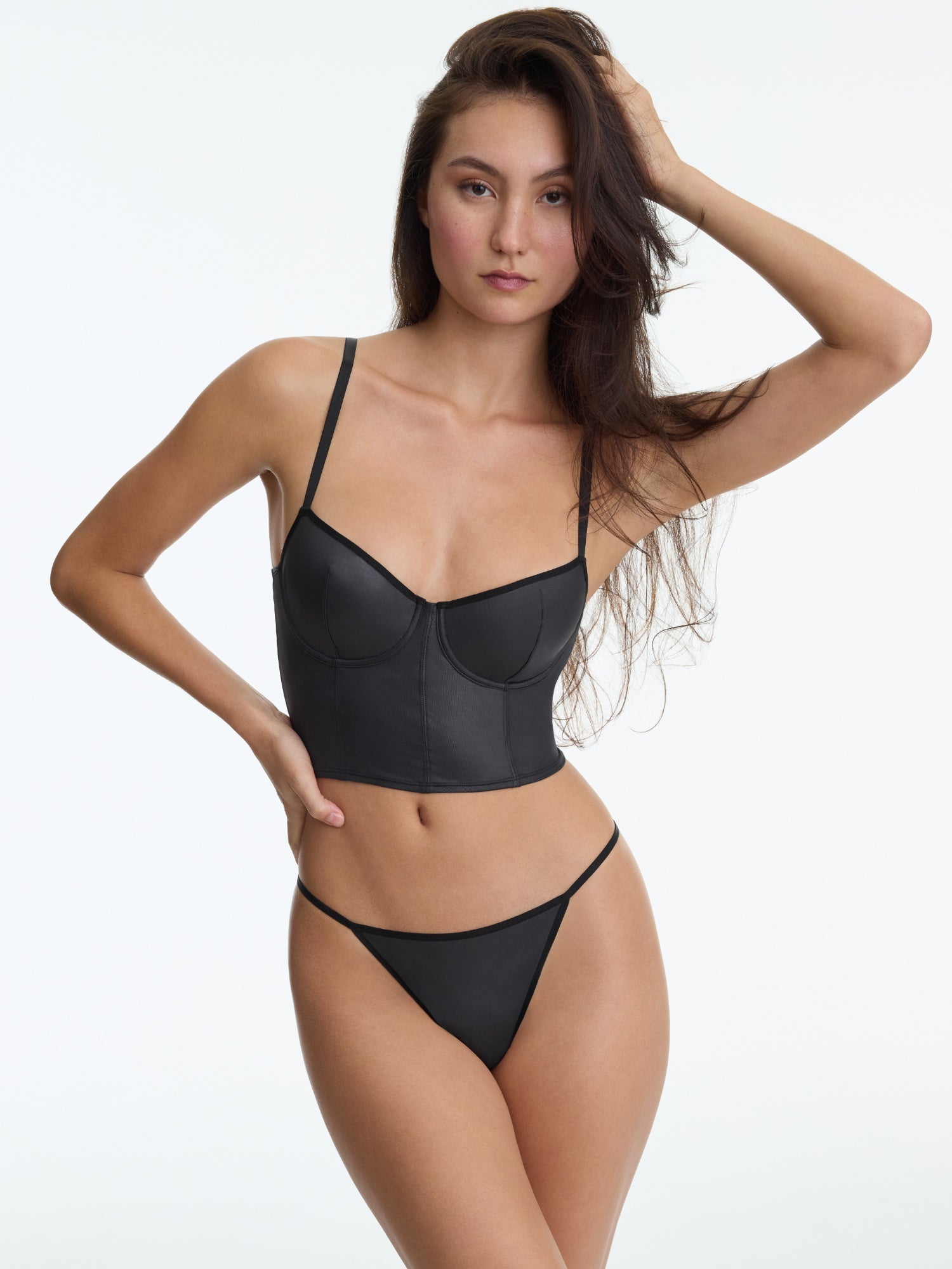 Skarlett Blue Late Night Faux Leather Corset Cami and Late Night Faux Leather G-String Thong in Black - close-up front view of cropped underwire cami and string thong in faux leather